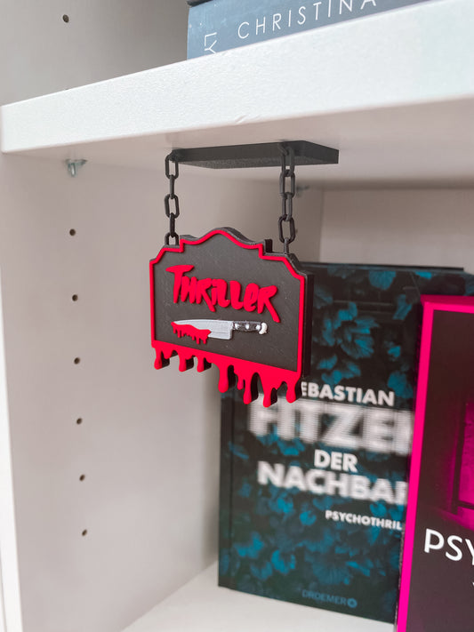 Hängendes Regalschild „Thriller“