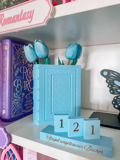 Blumenvase in Buchform