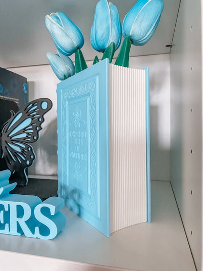 Blumenvase in Buchform