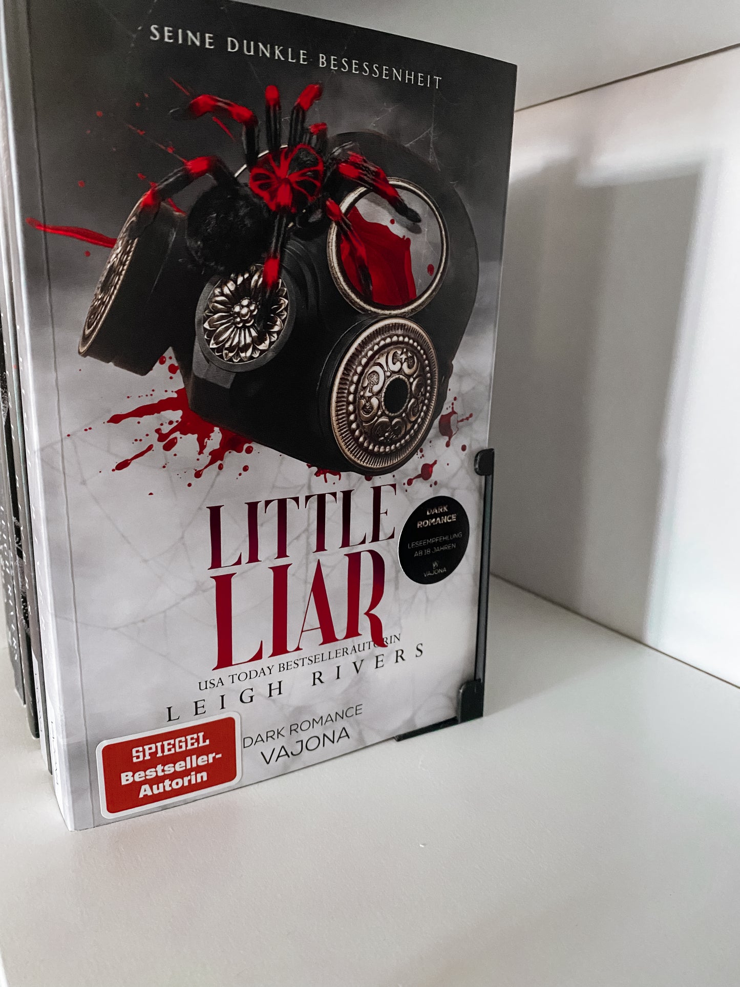 Unsichtbare Buchstütze