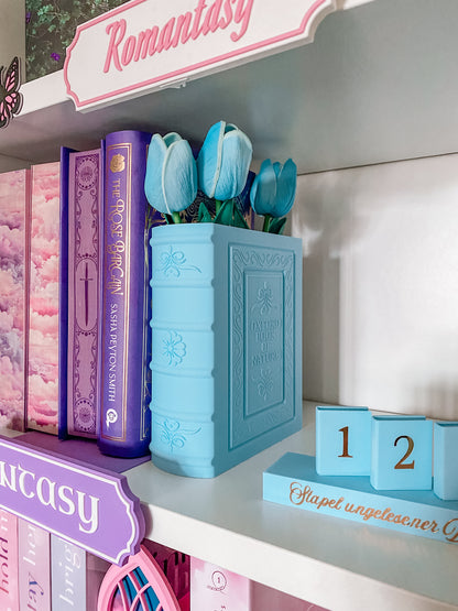 Blumenvase in Buchform