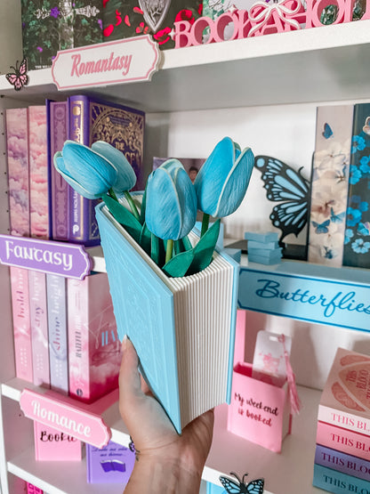 Blumenvase in Buchform