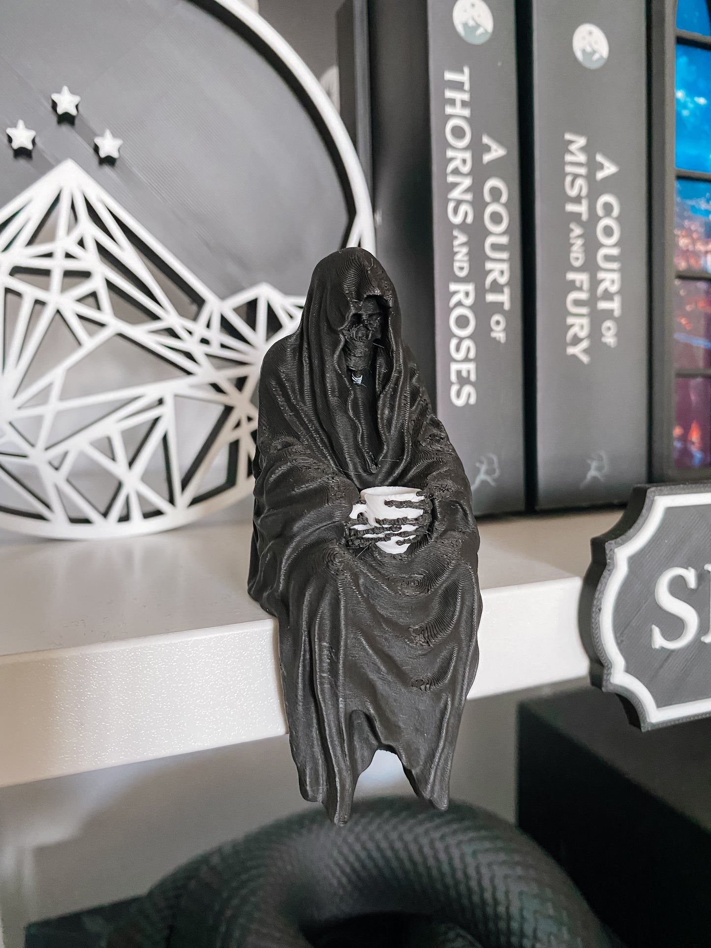 Sensenmann mit Teetasse