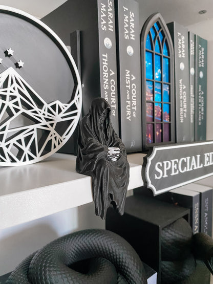 Sensenmann mit Teetasse