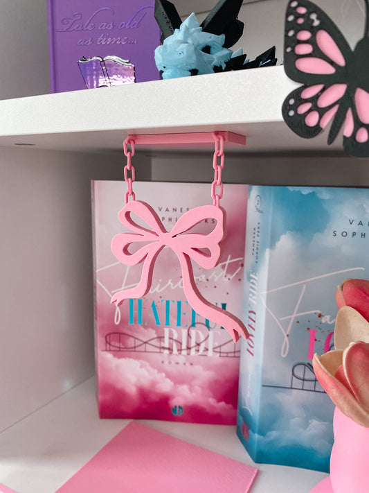 Hängendes Regalschild „Schleife“